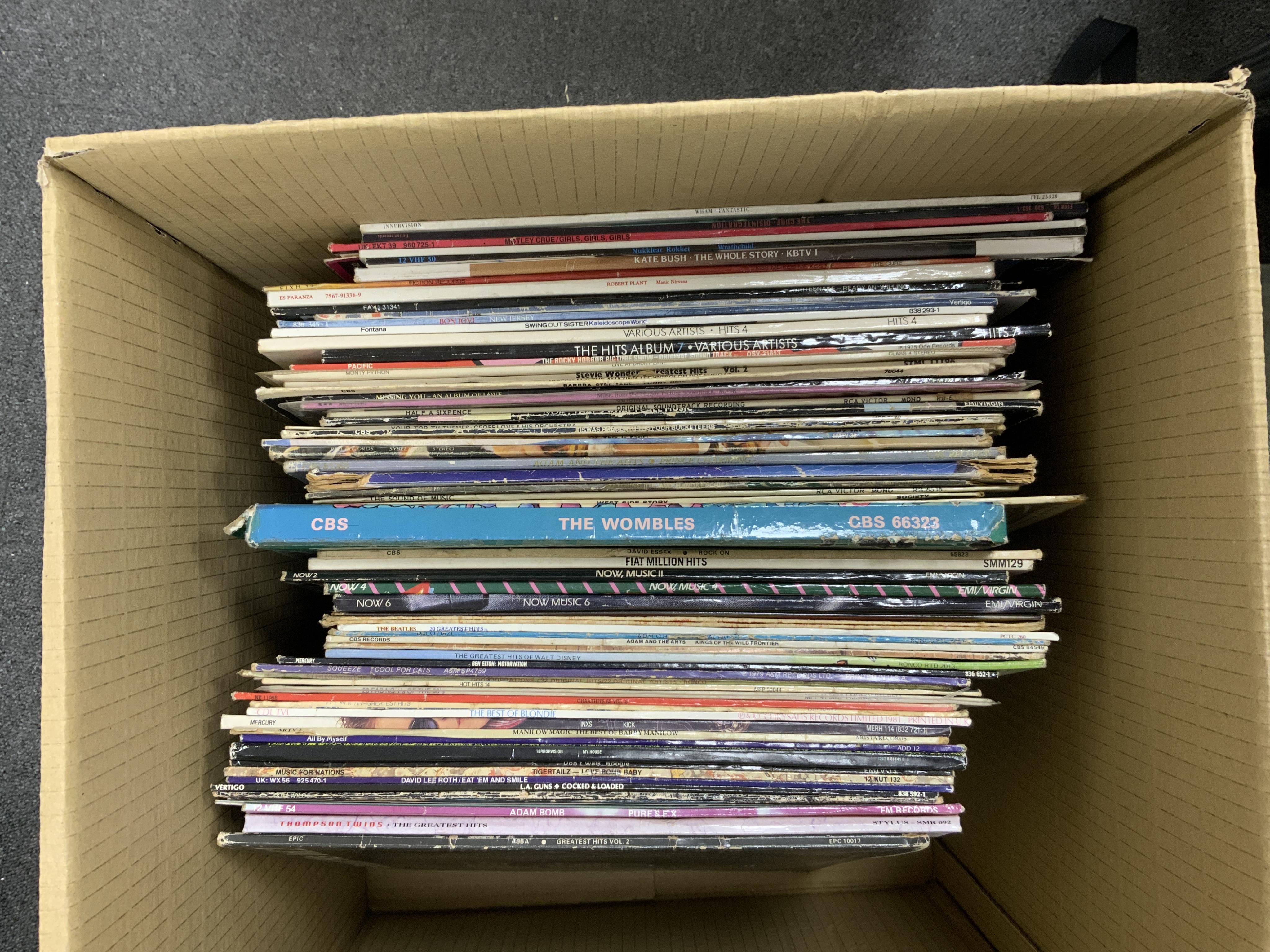 Seventy LP record albums, 12” singles, compilations, etc. artists including; Boy George, Wham! Belinda Carlisle, The Cure, Jimi Hendrix, Bon Jovi, Stevie Wonder, Adam and the Ants, Robert Plant, Kate Bush, etc., and some